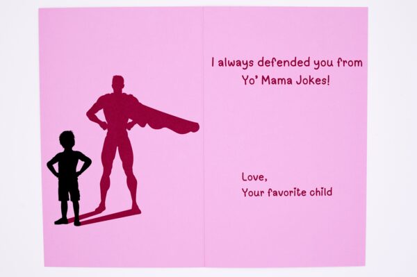 Pink card with superhero dad and son.