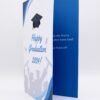 Graduation card with blue accents.