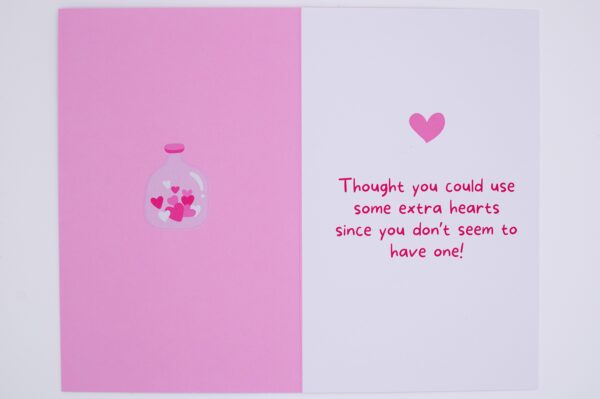 Pink card with hearts in a jar.