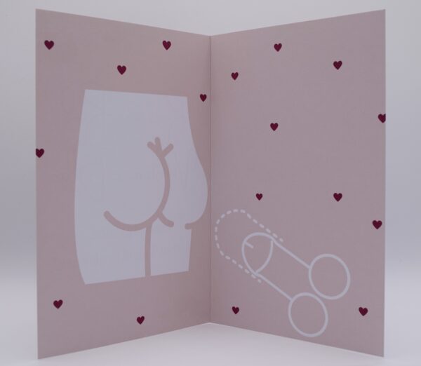 Pink card with hearts and drawings.