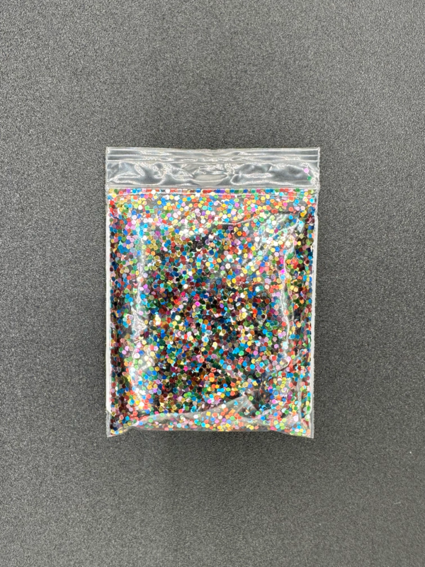 A bag of colorful iridescent glitter.