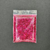 Pink glitter in a plastic bag.