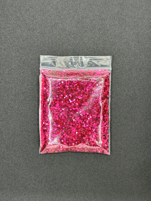 Pink glitter in a plastic bag.