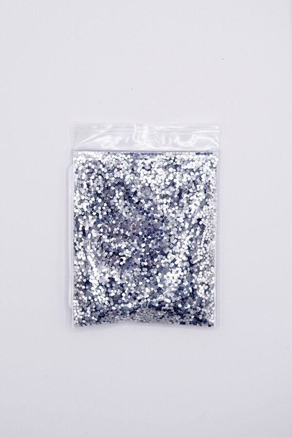 Silver glitter in a plastic bag.