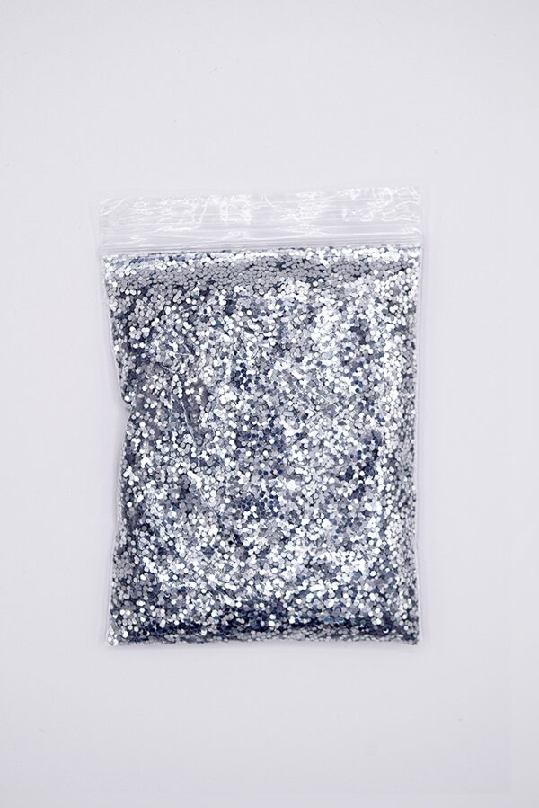 Silver glitter in a plastic bag.