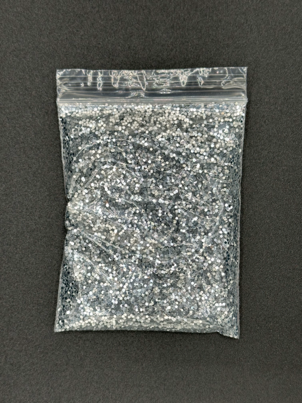 Silver glitter in a plastic bag.