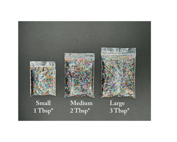 Three bags of multi-colored glitter.