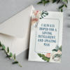 Floral card with quote about a man.